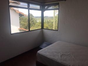 Postel nebo postele na pokoji v ubytování Espectacular Casa frente al campo de Golf