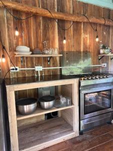 Kuchyň nebo kuchyňský kout v ubytování Cabaña con Rancho Deluxe
