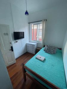 Cama ou camas em um quarto em VOY Hostales - Oriente