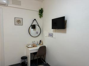TV a/nebo společenská místnost v ubytování B&B Porta Aperta