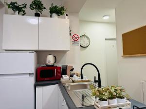 Kuchyň nebo kuchyňský kout v ubytování B&B Porta Aperta