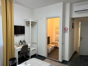 TV a/nebo společenská místnost v ubytování B&B Porta Aperta
