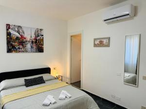 Postel nebo postele na pokoji v ubytování B&B Porta Aperta