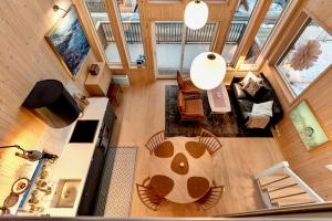 an overhead view of a living room with a table at Cathedral Lodge in Tromsø