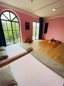 Postel nebo postele na pokoji v ubytování Thong Dong Homestay