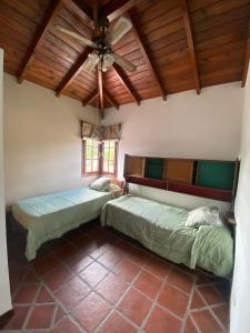 Postel nebo postele na pokoji v ubytování Lodelucy