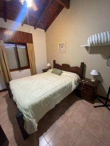 Postel nebo postele na pokoji v ubytování Lodelucy + 7 fotografií