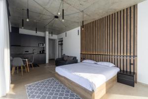 Postel nebo postele na pokoji v ubytování New Gudauri View Hotel