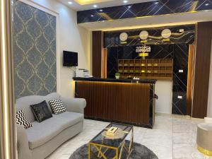 TV a/nebo společenská místnost v ubytování Giza Pyramids Boutique Hotel