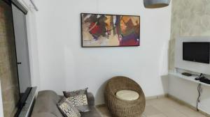 Televisyen dan/atau pusat hiburan di Casa em Condomínio Conchas e Corais