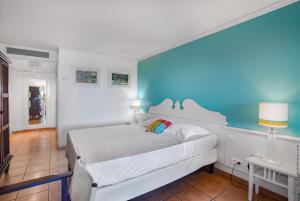 Lova arba lovos apgyvendinimo įstaigoje Studio Premium vue Mer et Piscine, résidence de vacances