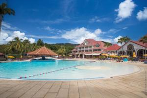 Baseinas apgyvendinimo įstaigoje Studio Premium vue Mer et Piscine, résidence de vacances arba netoliese
