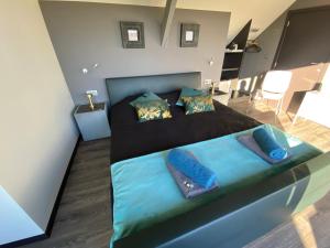 Voodi või voodid majutusasutuse Escape to Unwind toas
