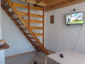TV a/nebo společenská místnost v ubytování duplex costa del sol nevochea