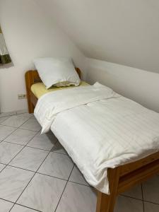 Postel nebo postele na pokoji v ubytování HS Hotel