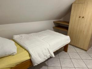Postel nebo postele na pokoji v ubytování HS Hotel