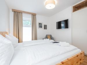 Łóżko lub łóżka w pokoju w obiekcie Ski Nature Apartment Lungau Top 8