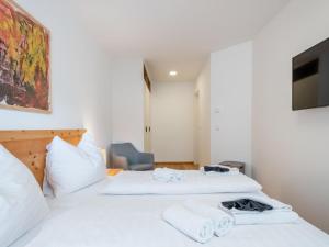 Łóżko lub łóżka w pokoju w obiekcie Ski Nature Apartment Lungau Top 8