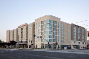 a large building on the corner of a street at Residence Inn by Marriott San Jose Airport in San Jose