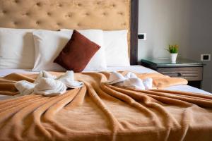Voodi või voodid majutusasutuse Cairo Paradise Hotel toas