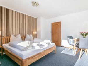 Posteľ alebo postele v izbe v ubytovaní Brixen Alpin Living Top 1