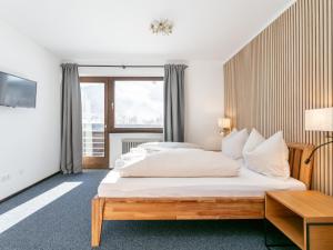 Posteľ alebo postele v izbe v ubytovaní Brixen Alpin Living Top 1