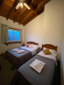 Ένα ή περισσότερα κρεβάτια σε δωμάτιο στο Hotel Totem de Mar