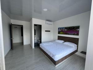 Postel nebo postele na pokoji v ubytování Hotel Mar Verde