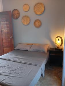 Postel nebo postele na pokoji v ubytování Tsada Balay Homestay