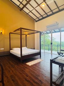a bedroom with a bed in a room at Araliya Villa in Tangalle