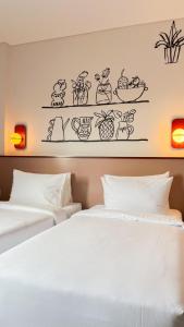 Letto o letti in una camera di Kotta GO Hotel Tegal