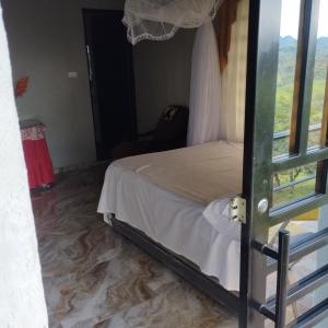 Postel nebo postele na pokoji v ubytování Mirador Alpe D, Huez1