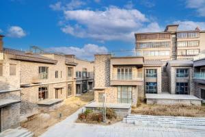 西安Xiyou Hotel Xi'an City Wall Branch禧又HOTEL的旧砖房的图象