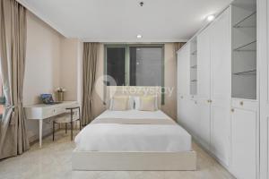 En eller flere senge i et værelse på Brassia by Kozystay - Thamrin + 38 billeder