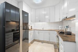 Køkken eller tekøkken på Brassia by Kozystay - Thamrin