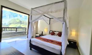 Voodi või voodid majutusasutuse Sài Gòn - Bản Giốc Resort toas