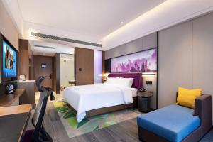 Postel nebo postele na pokoji v ubytování Hampton by Hilton Zhangjiajie Tianmen Mountain + 37 fotografií