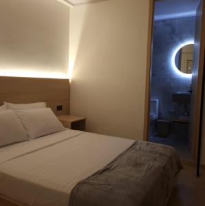 Cama ou camas em um quarto em Santa Julia Alojamiento