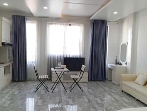 TV a/nebo společenská místnost v ubytování TQ 3 Hotel & Apartment + 6 fotografií