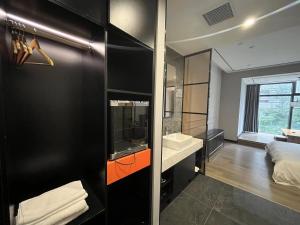 云幕国际酒店（重庆北滨路鎏嘉码头店）房間的床
