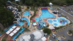 an overhead view of a water park with several pools at Mirada al Mar 02 in Aguadilla