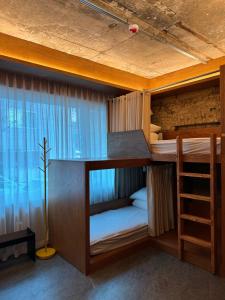 Postel nebo postele na pokoji v ubytování DADU House