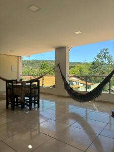 Uma varanda ou terraço em Pousada Vista da Serra - Suzart