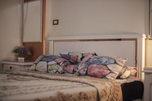 Postel nebo postele na pokoji v ubytování Star House City Stars