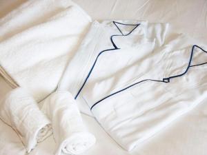 Uma cama ou camas num quarto em Hotel Resol Gifu