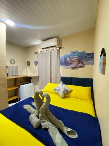 Postel nebo postele na pokoji v ubytování Casa Silveira Noronha