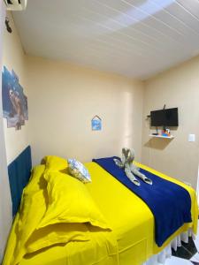 Postel nebo postele na pokoji v ubytování Casa Silveira Noronha