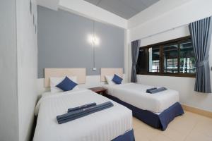 Postel nebo postele na pokoji v ubytování C4 Resort