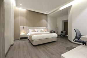Hotel Swarn Towers客房内的一张或多张床位