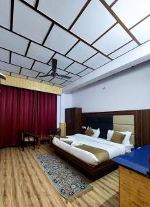 Postel nebo postele na pokoji v ubytování Hotel Cloud Height
